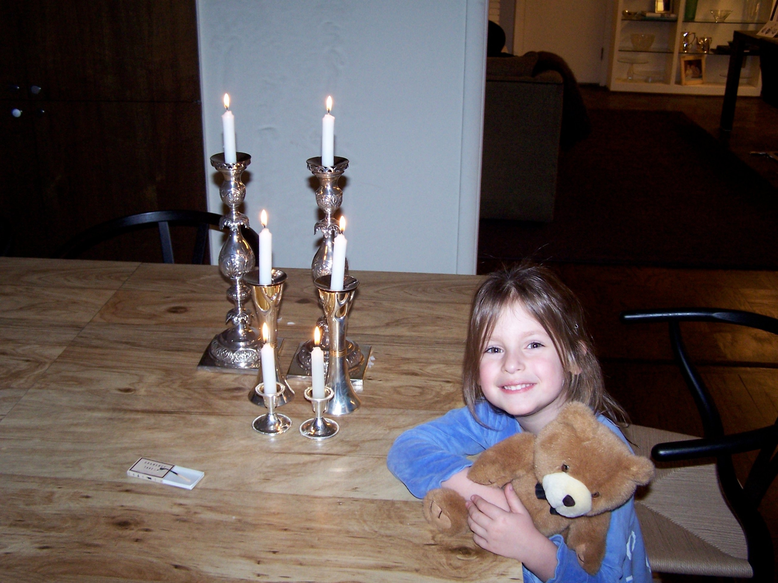 Picture of a daughter with a bear during shabbat